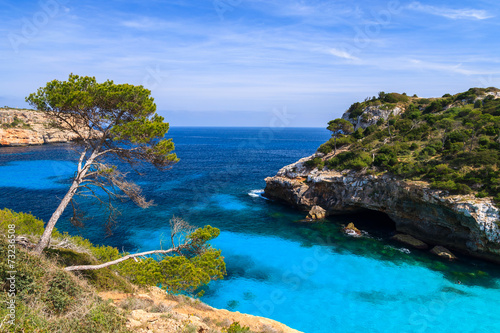 Fototapeta Naklejka Na Ścianę i Meble -  Beautiful beach azure sea water, Cala des Moro, Majorca island