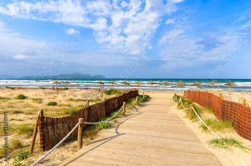 Path to sandy Can Picafort beach, Majorca island, Spain photo