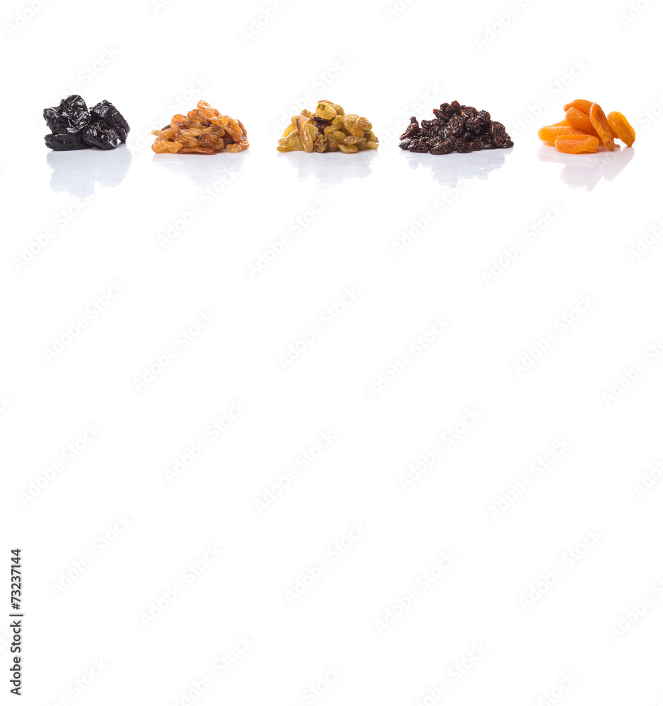Obraz premium Mix dried fruit variety over white background