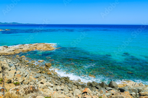 Rocks and sea on coast of Sardinia island near Peppino beach