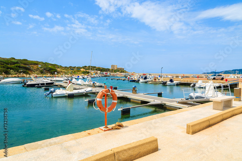 View of Porto Giunco port with sailboats and yachts, Sardinia