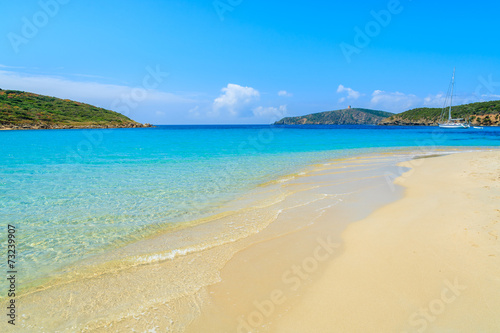 Sand and turquoise sea water of Teuleda beach, Sardinia island