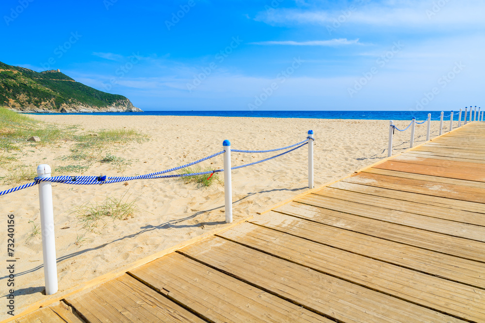 Wooden walkway to Capo Boi sandy beach, Sardinia island, Italy