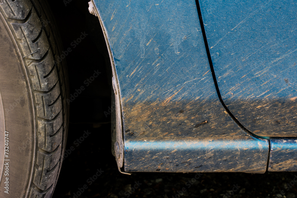 dirty car after race, see mud on one side dirty car after race, see mud on one side