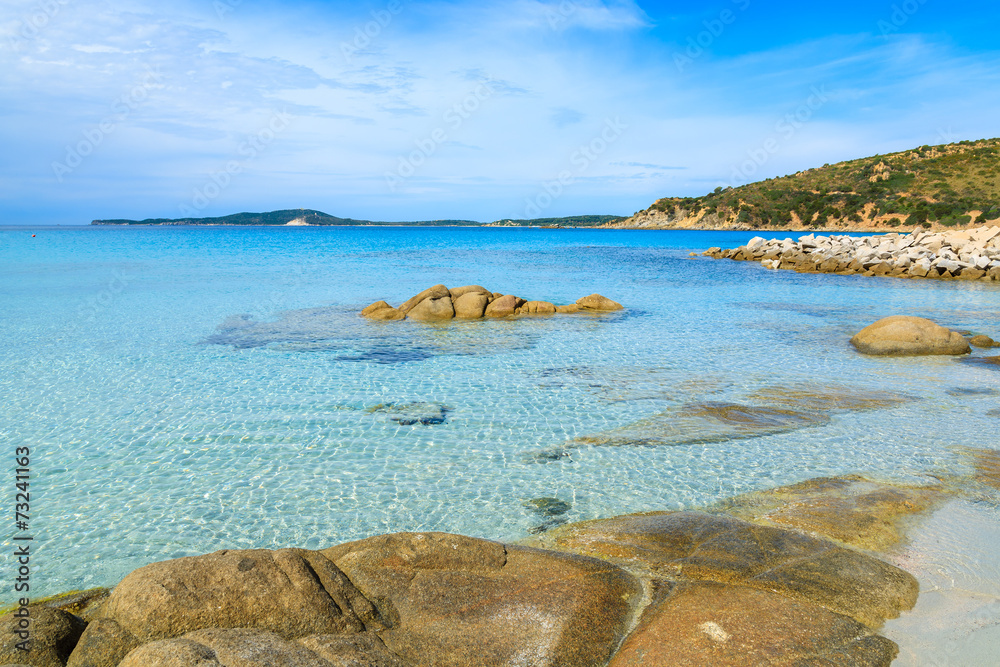 Rocks in sea water of Punta Molentis beach, Sardinia island