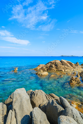 Rocks and azure sea water of Porto Giunco beach, Sardinia island