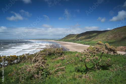 Beautiful Summer landscape of Rhosilli Bay beach Gower peninsula photo