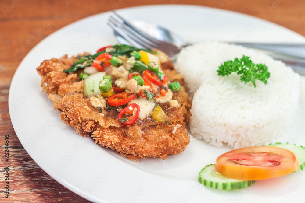 Fried pork with basil on jasmine rice