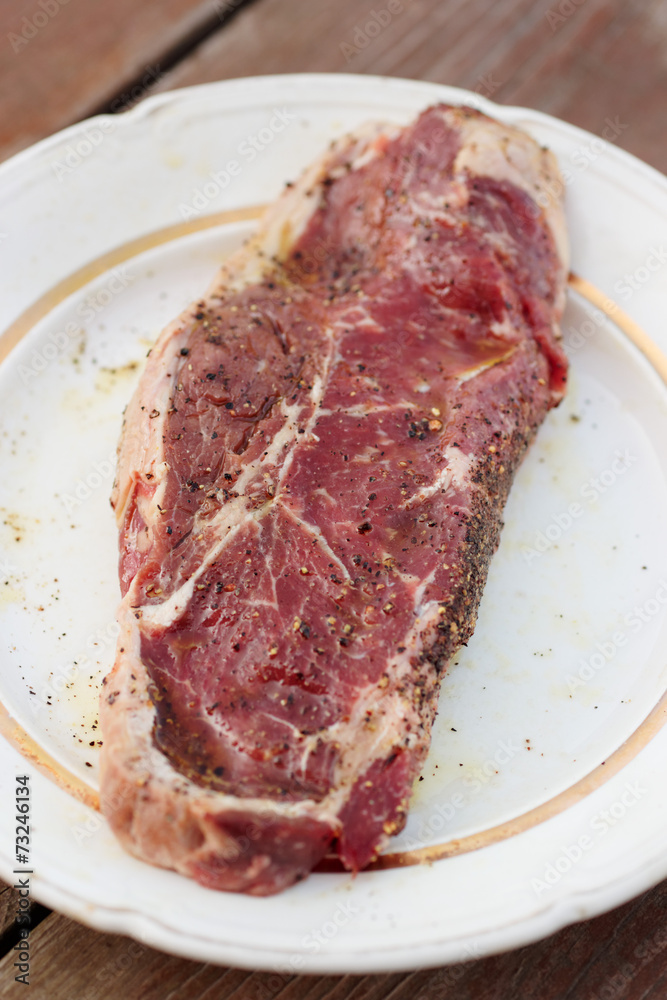 Striploin steak, shallow depth of field Striploin steak, shallow depth of field