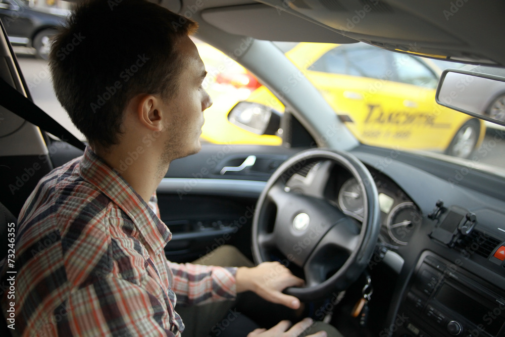 inside the car driver driving on the road
