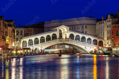 Night view of Rialto bridge and Grand Canal in Venice. Italy