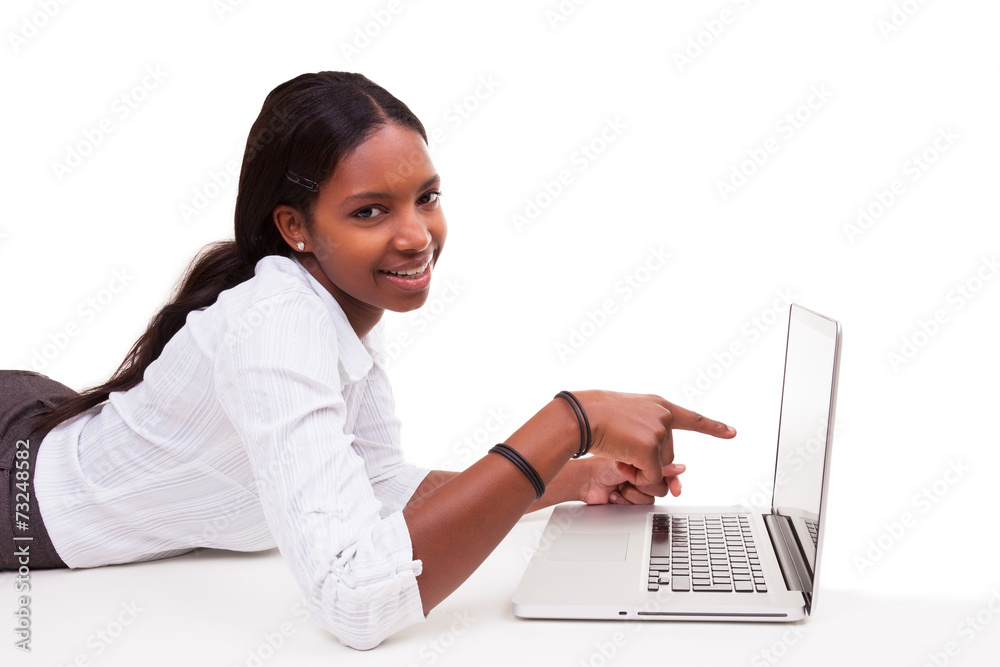 African American woman using a laptop - Black people African American woman using a laptop - Black people