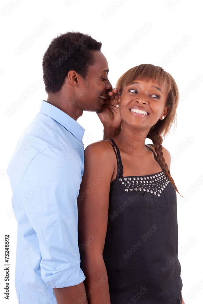 African American young couple sharing a secret - Black people African American young couple sharing a secret - Black people