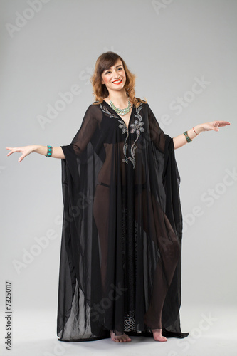 Portrait of the young sexy woman in black tunic Arabic