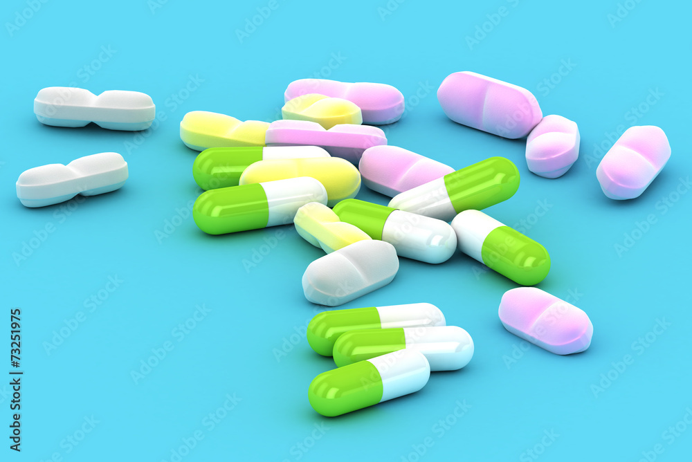 A Group of Medical Pills on a blue background A Group of Medical Pills on a blue background