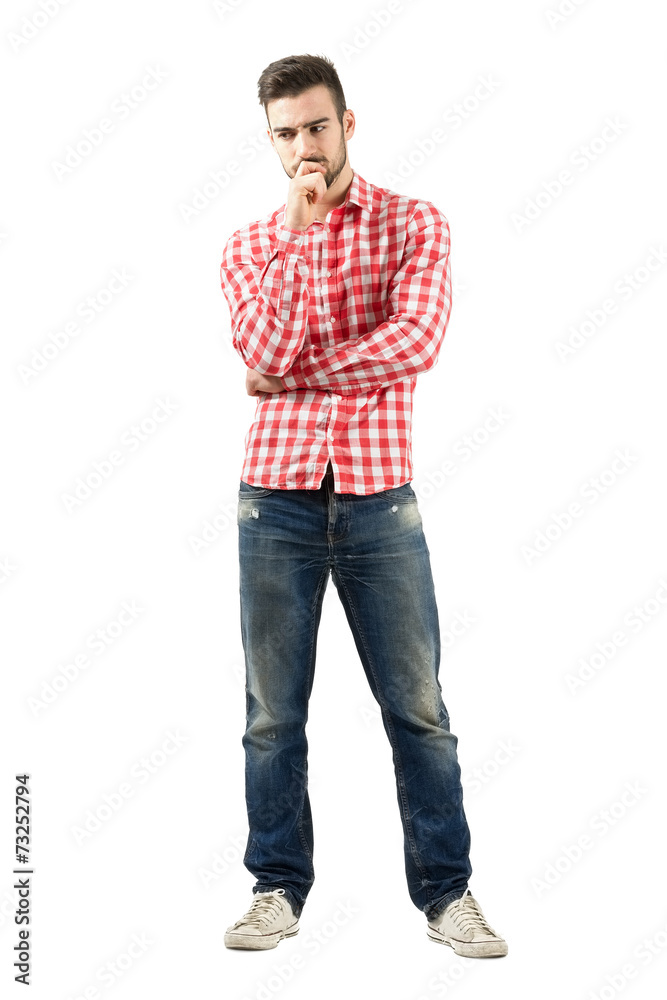 Worried standing man looking down isolated Worried standing man looking down isolated