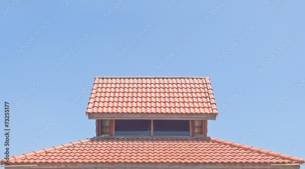 Fototapeta premium Roof tiles under clear blue sky