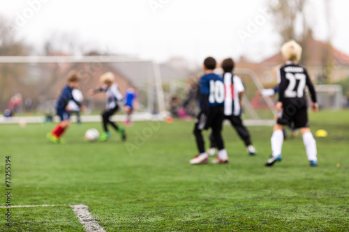 Blurred soccer kids © Mikkel Bigandt