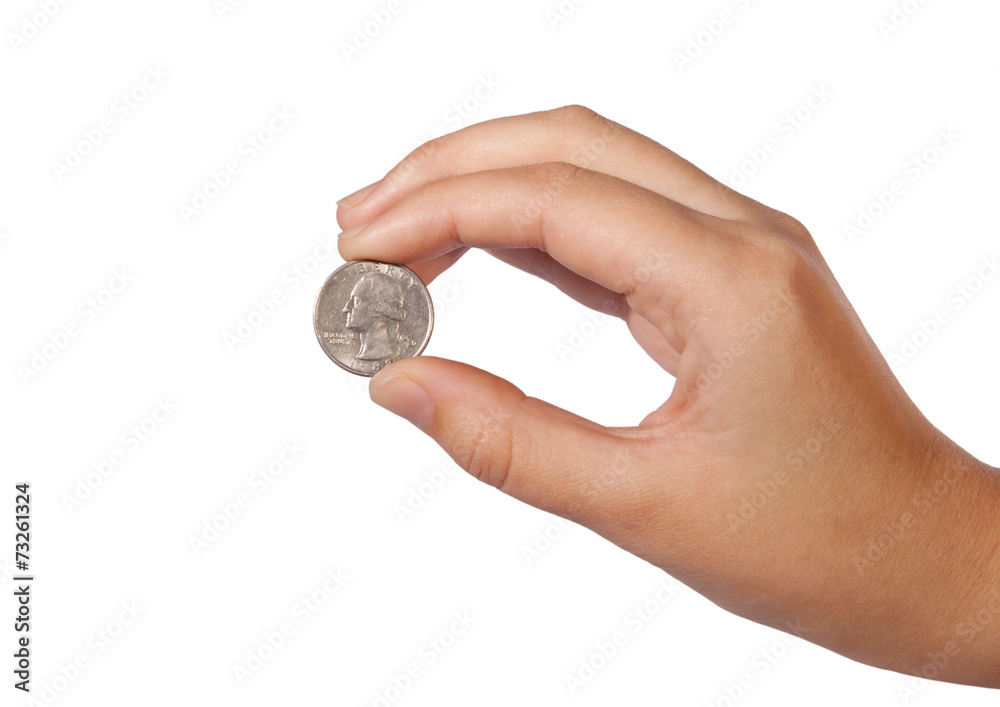 US coin between the fingers on white background US coin between the fingers on white background