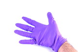 Hand wearing surgical glove