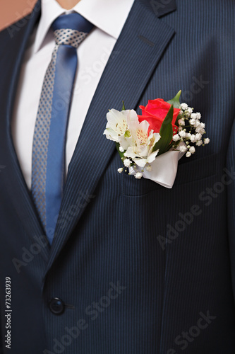 Holiday attire groom at a wedding.