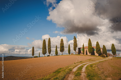 Classic house with cypress trees in Tuscany