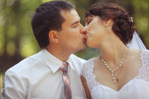 bride and groom at a wedding in summer nature