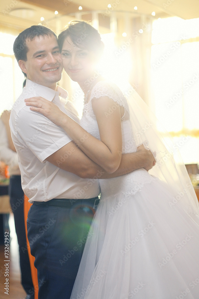 bride and groom portrait in the room