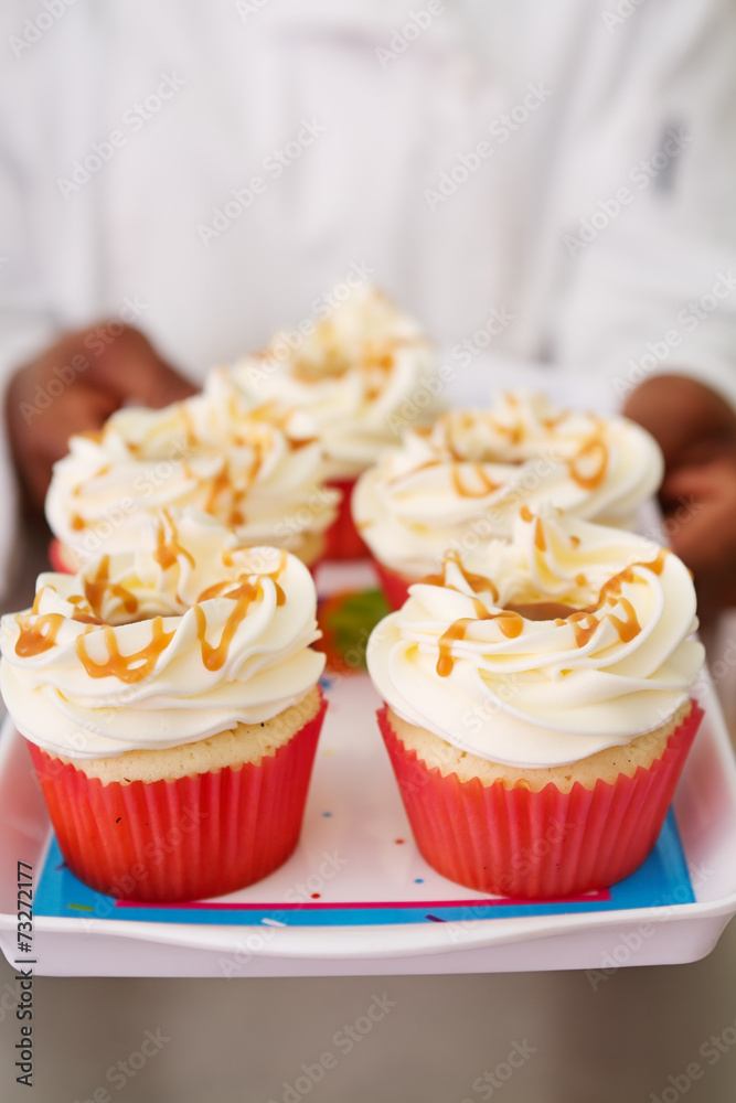 Tray of salted caramel cupcakes