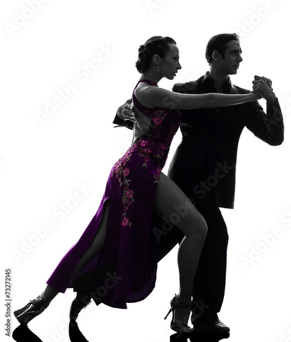 couple man woman ballroom dancers tangoing silhouette