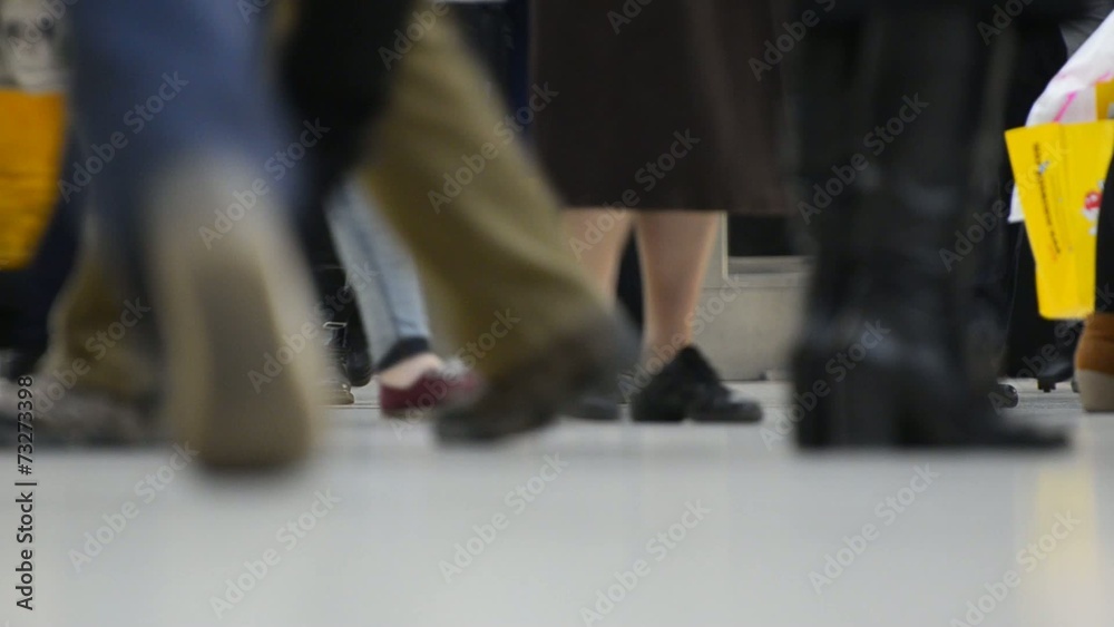 people walking in railway station people walking in railway station
