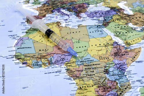 syringe on a map of africa