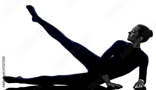Fototapeta Naklejka Na Ścianę i Meble -  woman exercising stretching yoga silhouette