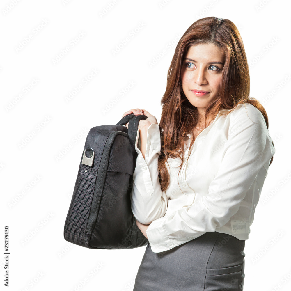 Beautiful brunette businesswoman holding handbag Beautiful brunette businesswoman holding handbag