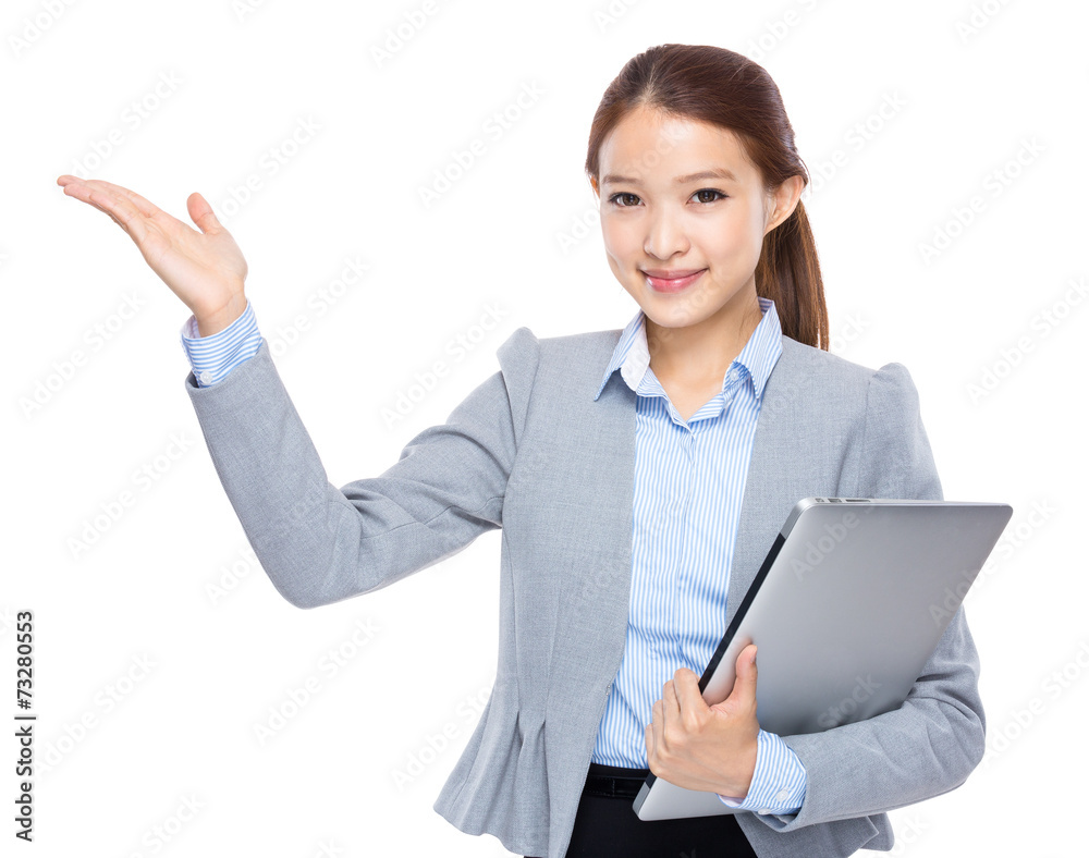 Businesswoman with laptop and open hand palm
