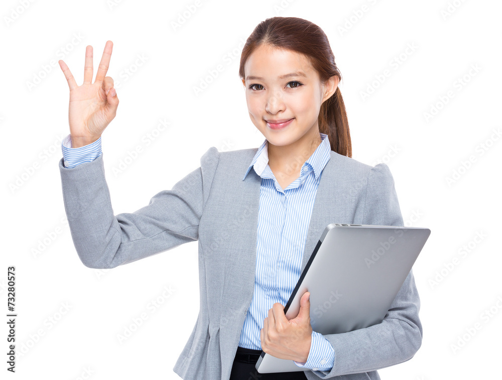 Businesswoman with laptop and ok sign Businesswoman with laptop and ok sign