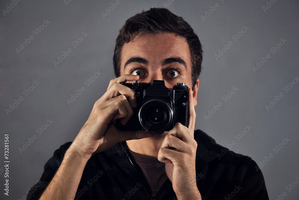 young photographer with analog camera young photographer with analog camera
