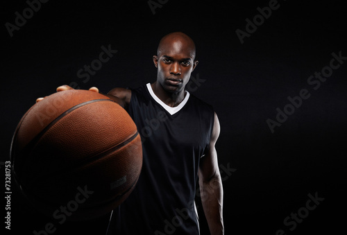 Professional basketball player against black background © Jacob Lund