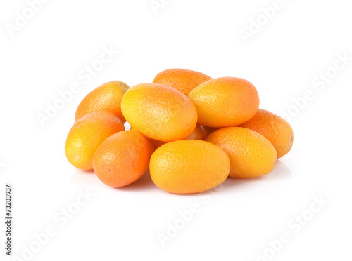 orange kumquats on white background