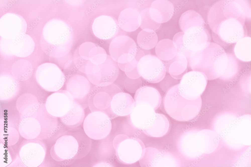 Holiday pink background with blurred bokeh lights