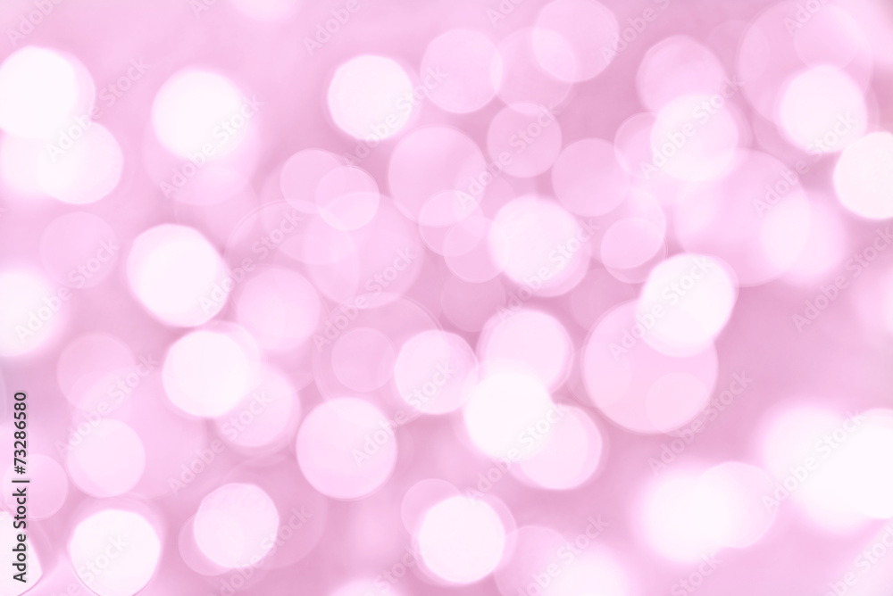 Holiday pink background with blurred bokeh lights Holiday pink background with blurred bokeh lights