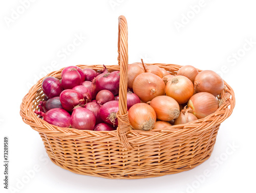 Full basket with onions crop