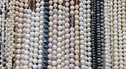 Stand with necklaces of pearls