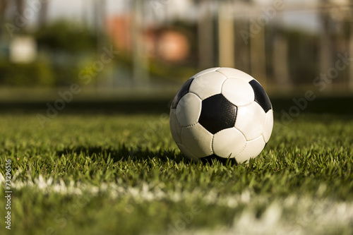 Soccer ball on a grass field. © beto_chagas