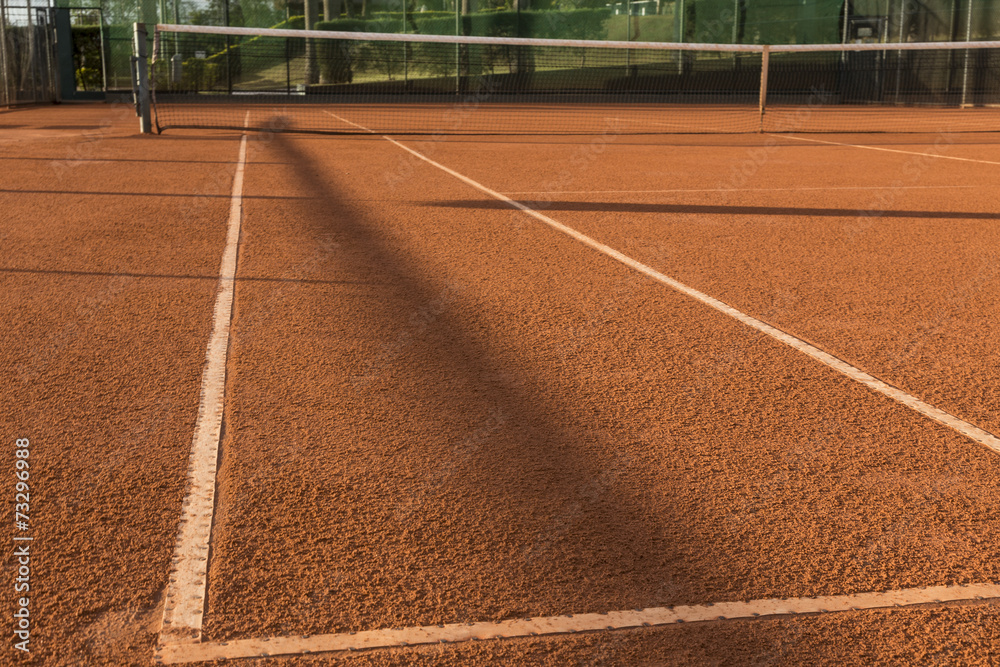 Clay (Dirt) Tennis Court.