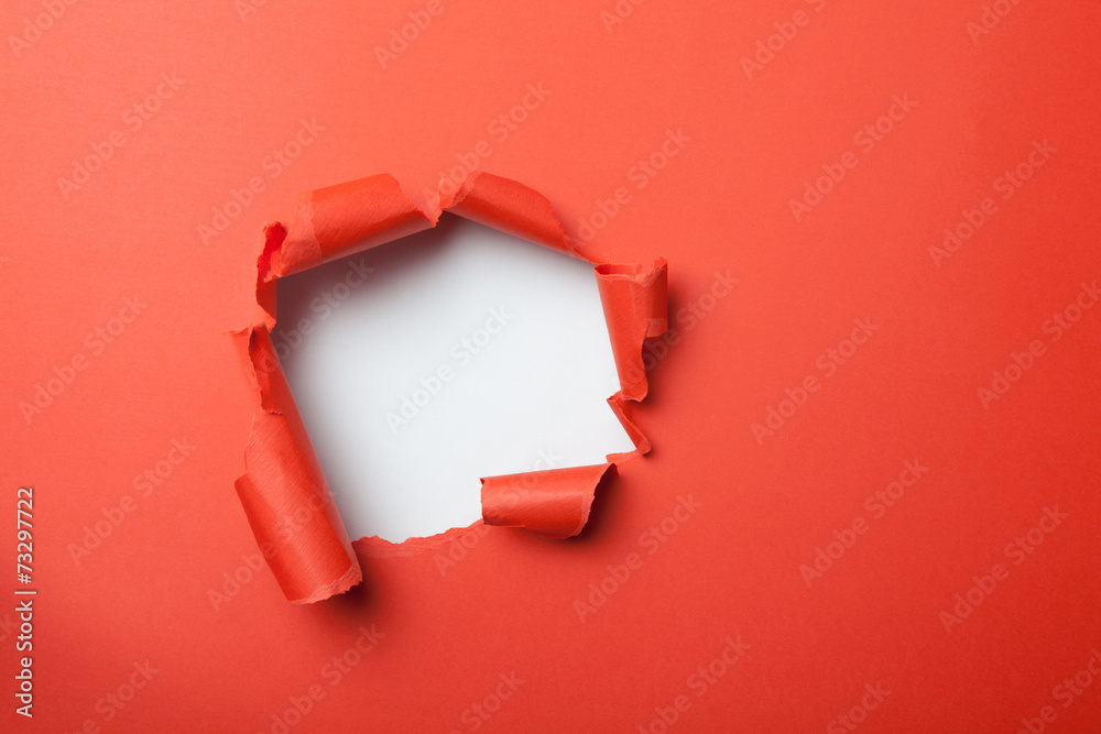 Fototapeta premium Red paper with hole