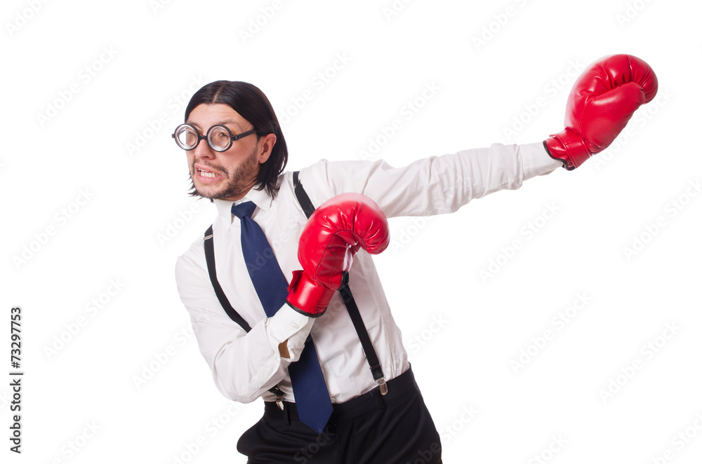 Funny young businessman with boxing gloves isolated on white Funny young businessman with boxing gloves isolated on white