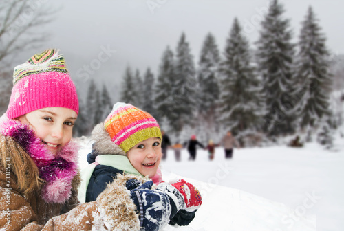 Children having fun in the snow