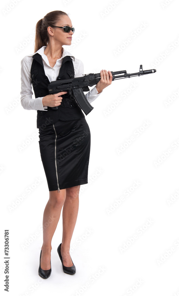 Businesswoman with a automatic rifle