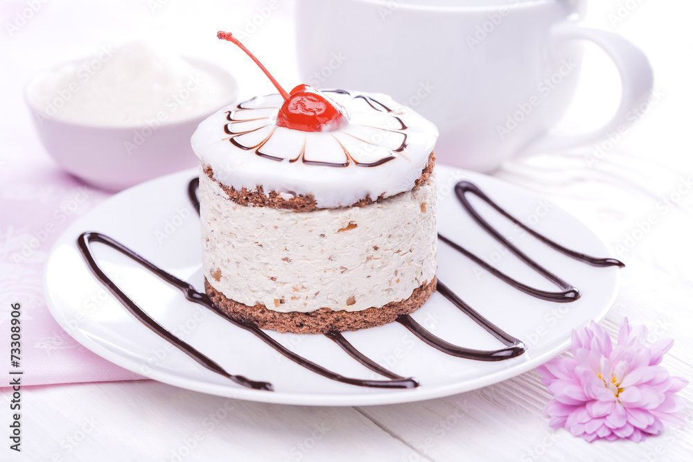 cherry cupcake on white wooden table cherry cupcake on white wooden table